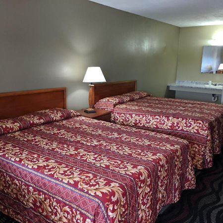Key West Inn - Hobart Меррилвилл Экстерьер фото