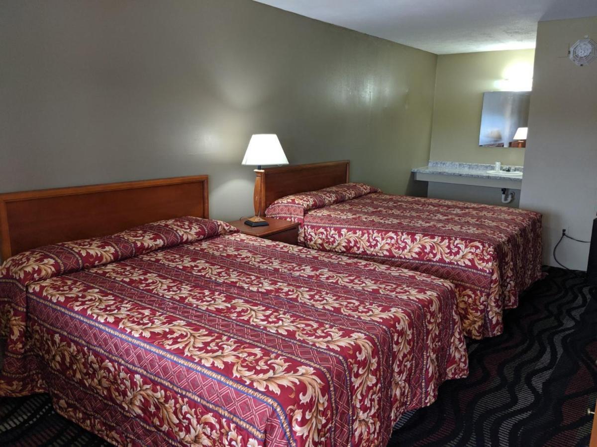 Key West Inn - Hobart Меррилвилл Экстерьер фото