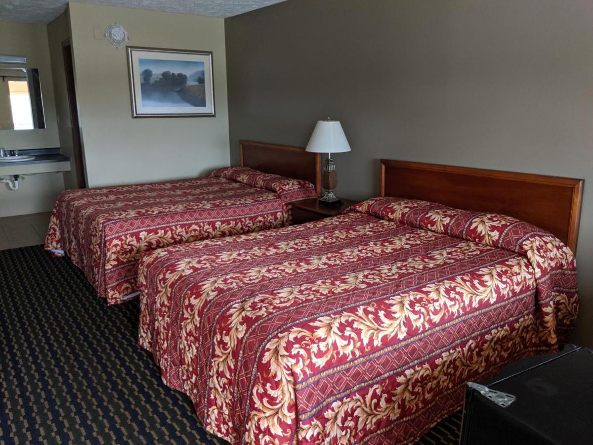 Key West Inn - Hobart Меррилвилл Экстерьер фото